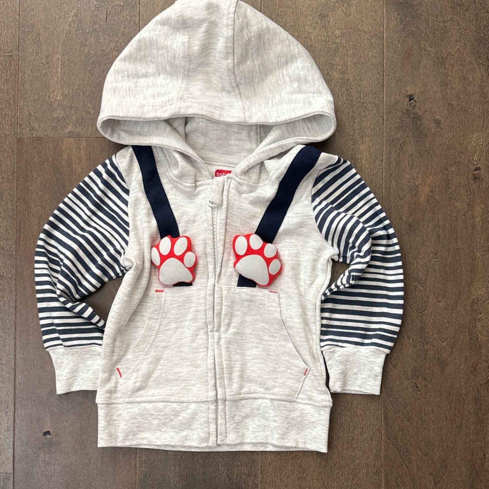 Cozy Cream Hoodie with Navy Stripes and Red Paw Accents